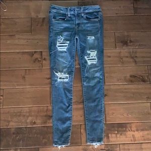 AMERICAN EAGLE DISTRESSED RIPPED JEGGINGS JEANS
